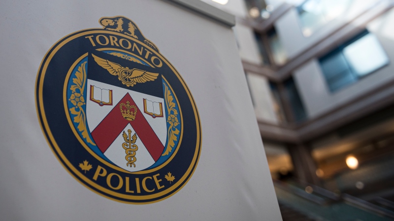 A Toronto Police Services logo is shown at headquarters, in Toronto, on Friday, August 9, 2019. THE CANADIAN PRESS/Christopher Katsarov