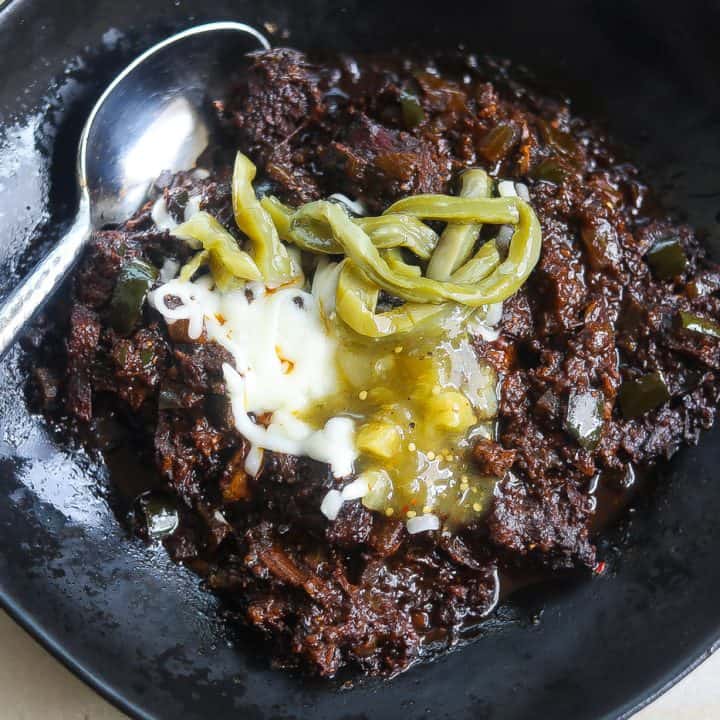 brisket chili in black bowl