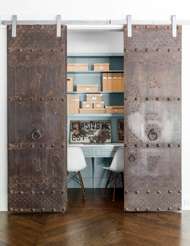 Closet home office with sliding barn doors