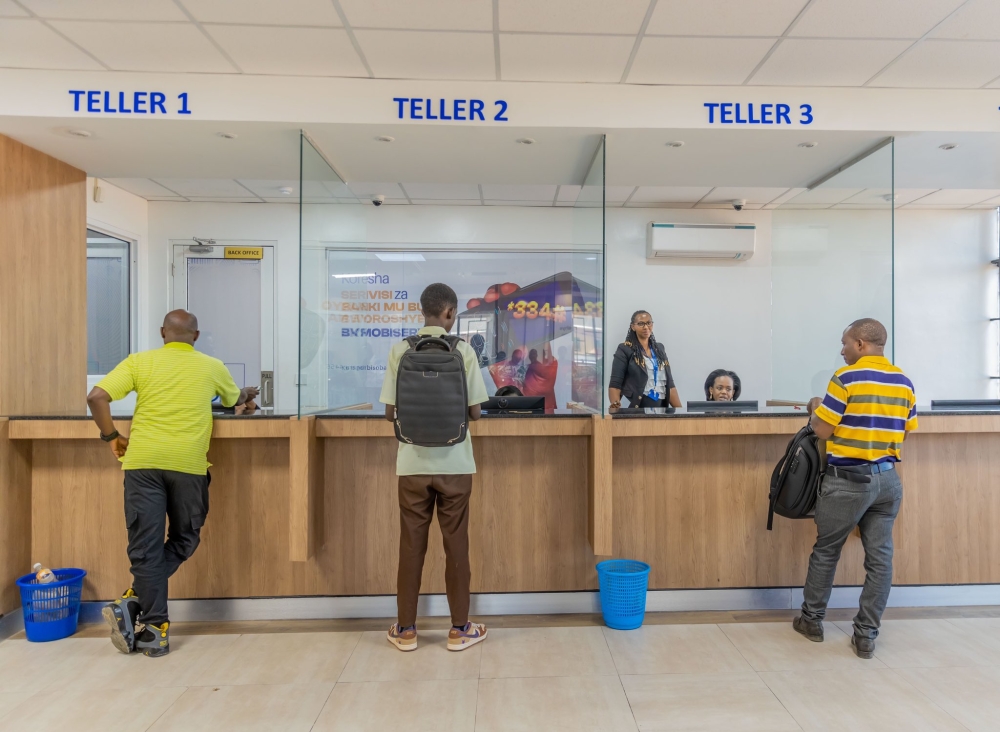 Bank tellers attend to clients at BK Giporoso branch. Financial institutions, including banks and insurance companies, are now mandated to provide information to the Commissioner General of the Rwanda Revenue Authority.