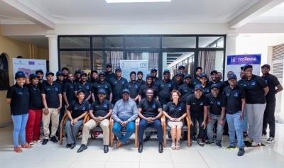 Participants pose for a group photo during  a week-long workshop held in Huye District. All photos by Craish Bhaizi