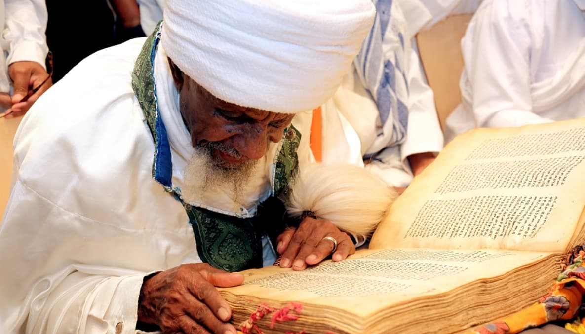 Liqa Kahenat Chief Kes Berko Tegegne reads from the Orit, written in the sacred language of Ge’ez. Photo: Michael Zekri