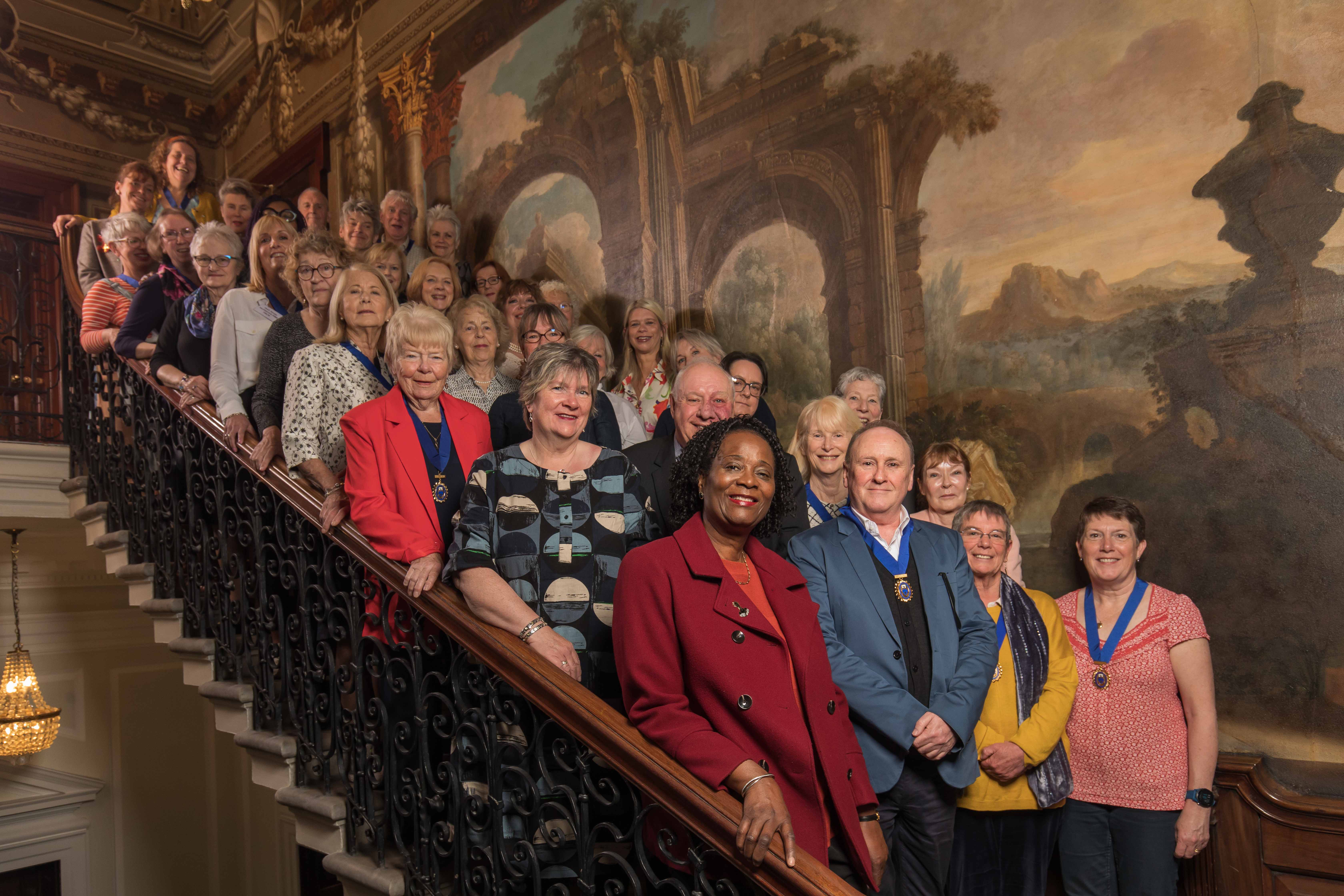 RCN Fellows standing on staircase at RCN HQ