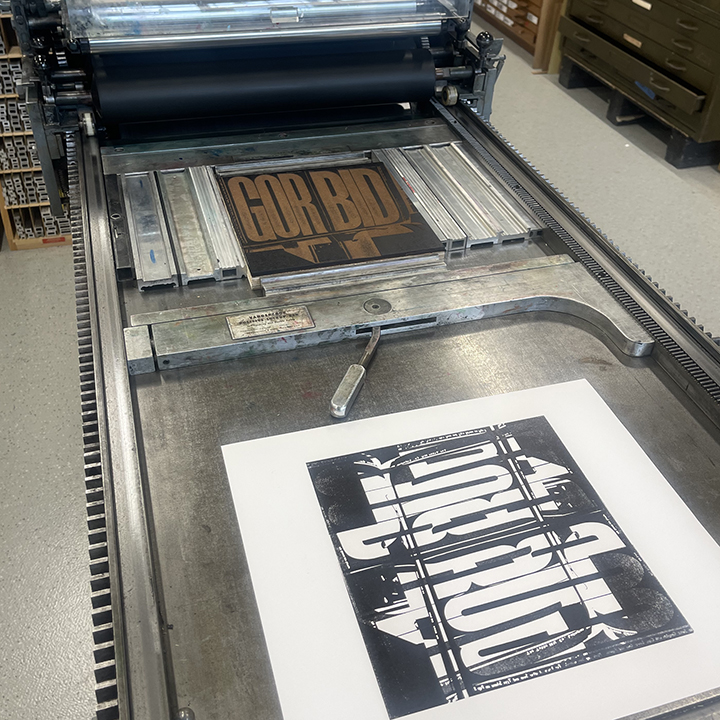 printing press with laser-cut plate and print