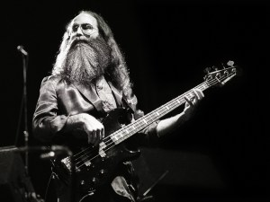 Leland Sklar, session bass guitarist, performs on stage as part of James Taylor's backing band, Carre, Amsterdam, Netherlands, 24th March 1986. He is playing a Yamaha bass guitar. (Photo by Rob Verhorst/Redferns)