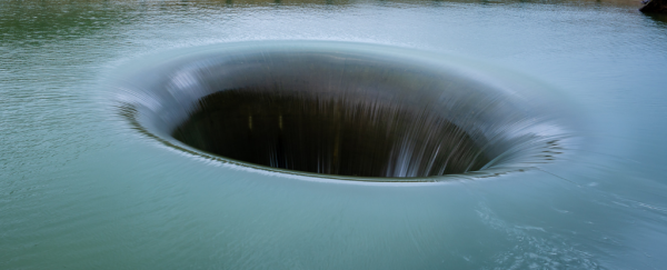 This bizarre hole in the water is not an optical illusion. It actually exists