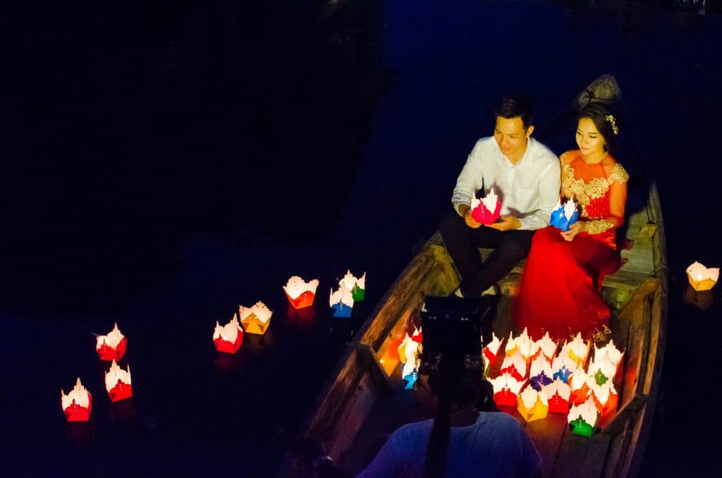 Couple during a photoshoot at the Japanese Bridge in Hoi An