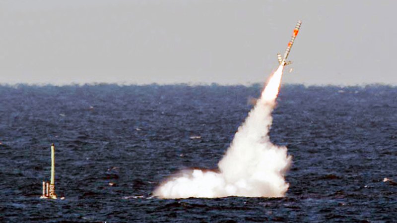 Submarine launches tomahawk cruise missile.