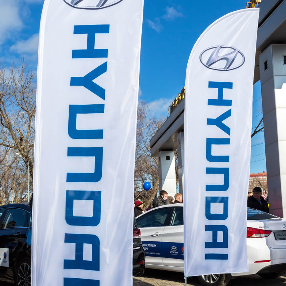 Promotional flags at a car showroom