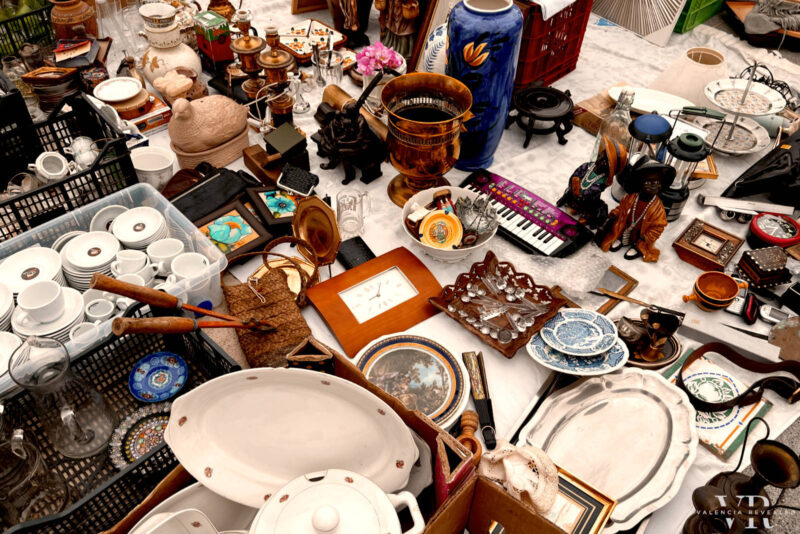 Dozens of small objects on a piece of cloth at El Rastro Market in Valencia