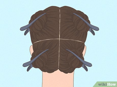 Step 3 Part your hair into 4 equal sections.