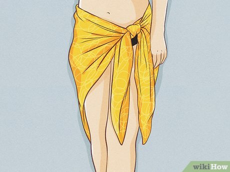 Step 2 Wear the sarong as folded or tucked skirt.