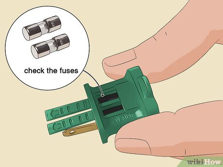 Step 6 Open the fuse box case and check if the fuses are black.